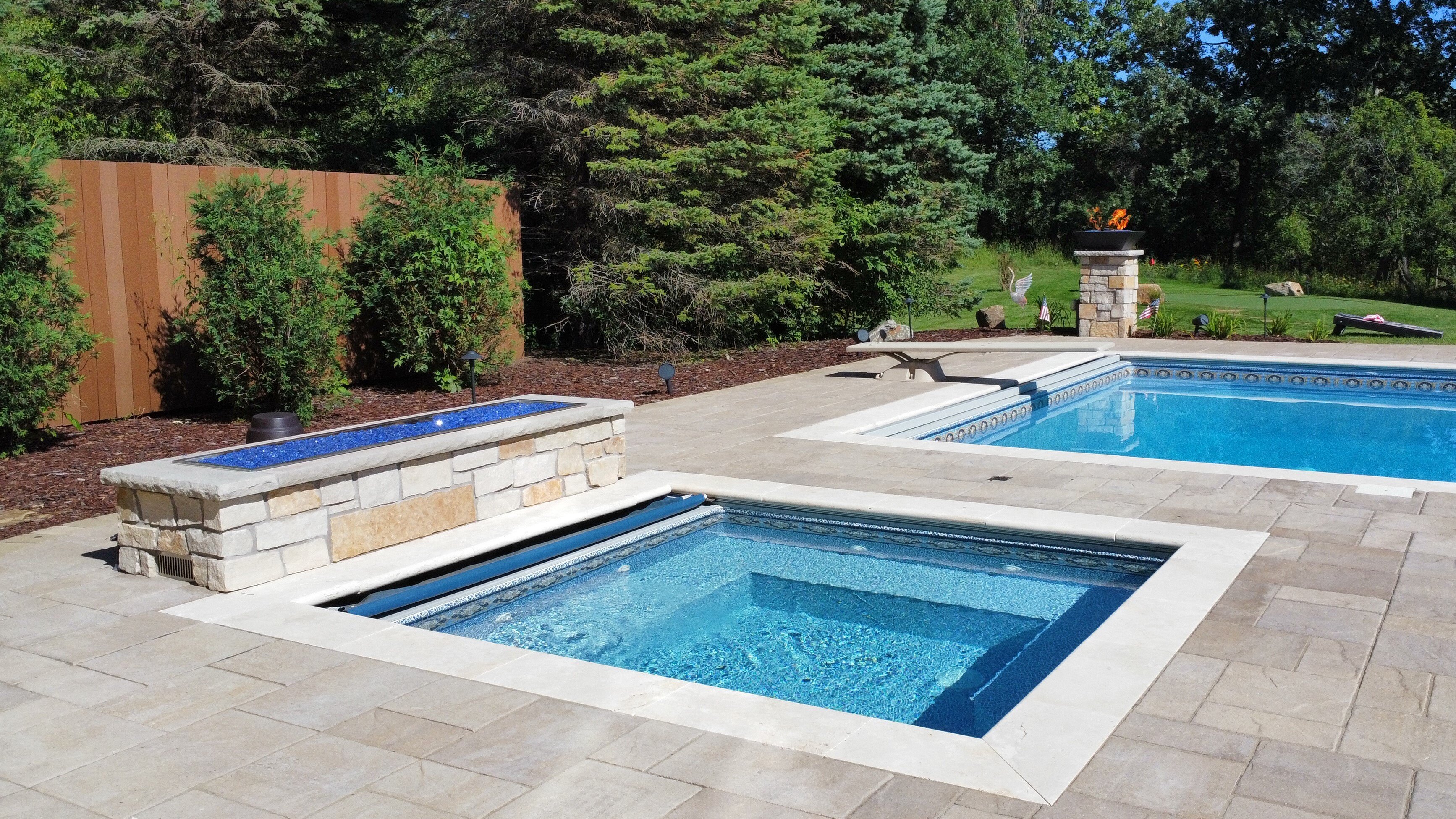 Why You Should Consider Adding a Hot Tub to Your Pool Installation